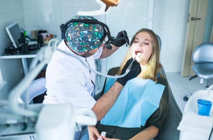 Dentist performing examination for Best Treatment for Oral Cancer in Kanpur